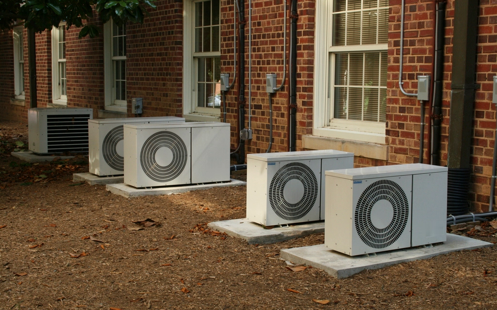 Outdoor HVAC condenser units at a service property